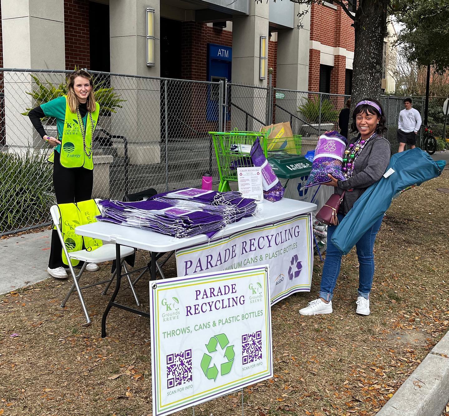 Volunteers recycling beads, cans, and plastic bottles at Mardi Gras parade.