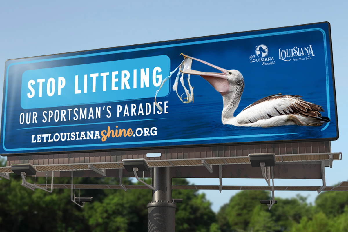 a billboard featuring a pelican with trash and the text "Stop Littering our sportman's paradise". a link to letlouisianashine.org and Keep louisiana and Louisiana tourism logo
