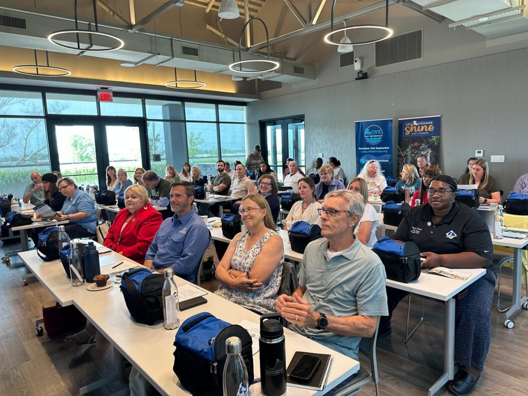 A group of people in a classroom setting